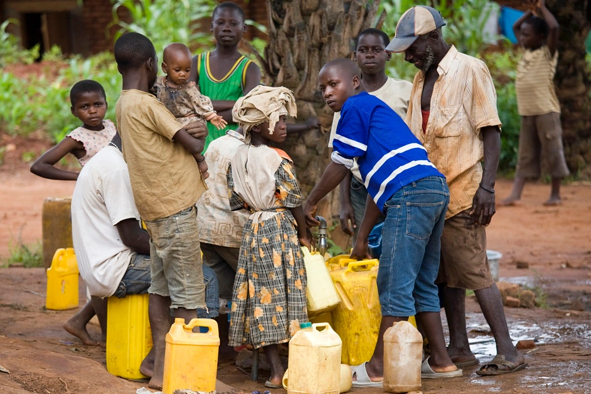village-life-locals-gather-around-for-water-collec-2025-04-03-02-29-04-utc